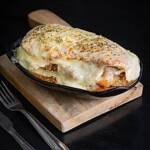 Parmegiana (Carne $55, Frango $50 ou Lombo $52)